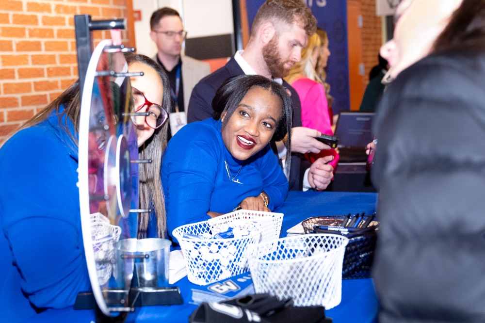 GVSU employee looks at wheel